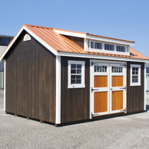 12x16 Cape cod shed with copper metal roof, charcoal stained siding and cedar stained door