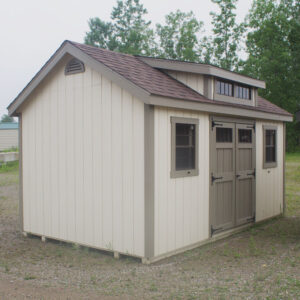 10 x 16 Cape Cod shed painted in natural white with brown doors