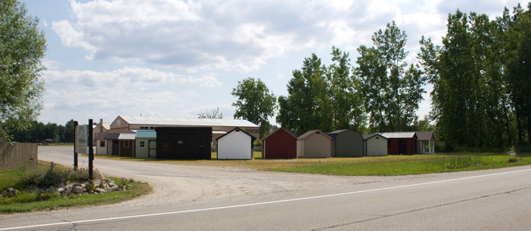 Sheds lined up at Central Cycles Lot on M-82 between Newaygo and Fremont