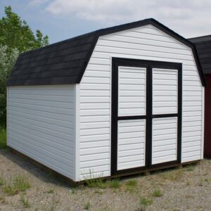 white sided mini barn shed with black roof and trim